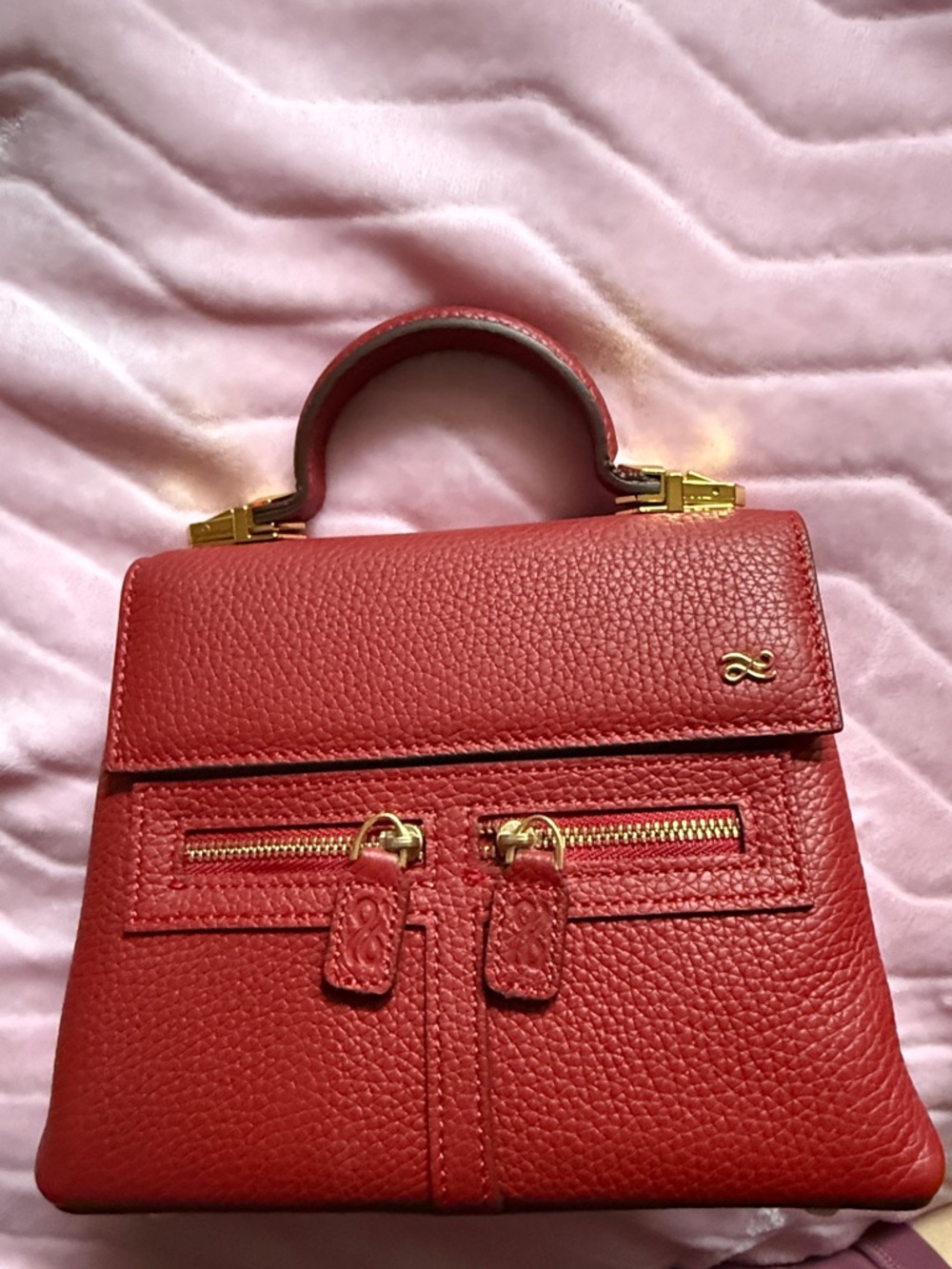 Structured Red Leather Top-Handle Satchel with Gold Accents